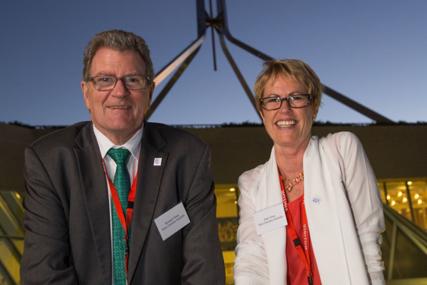 RCA Founders, Richard and Kate Vines infront of Australian Parliament House.